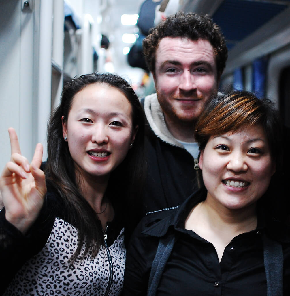 Three friends pose for a picture smiling because they are glad they no longer have any toxic relationships