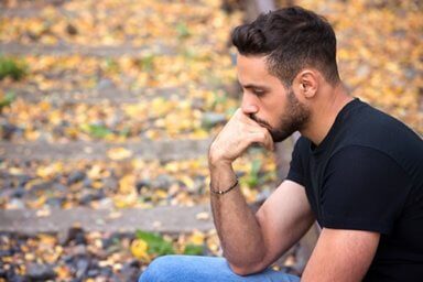 man pondering how to handle opioid withdrawal