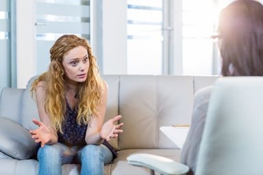 young woman taking part in dialectical behavioral therapy or dbt