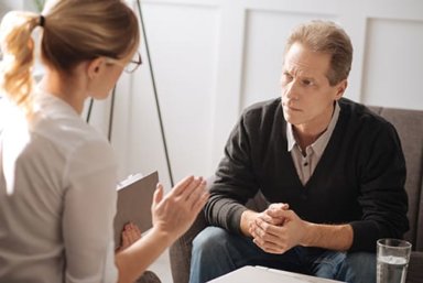 man participating in psychotherapy