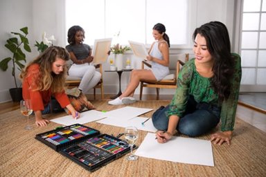 group of women participating in art therapy