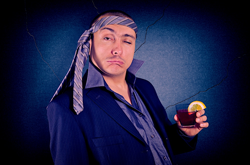 Drunk alcoholic man with an alcoholic face